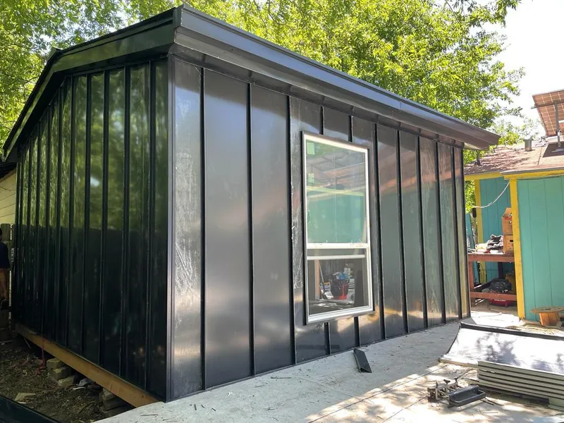 Black standing seam metal wall panels for Metal Roof Installation in Smithville